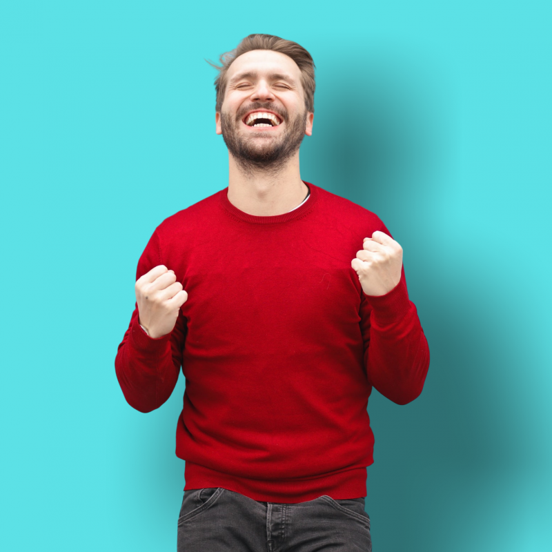 Man celebrating turquoise background and shadow
